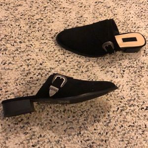 Black mule with buckle detail